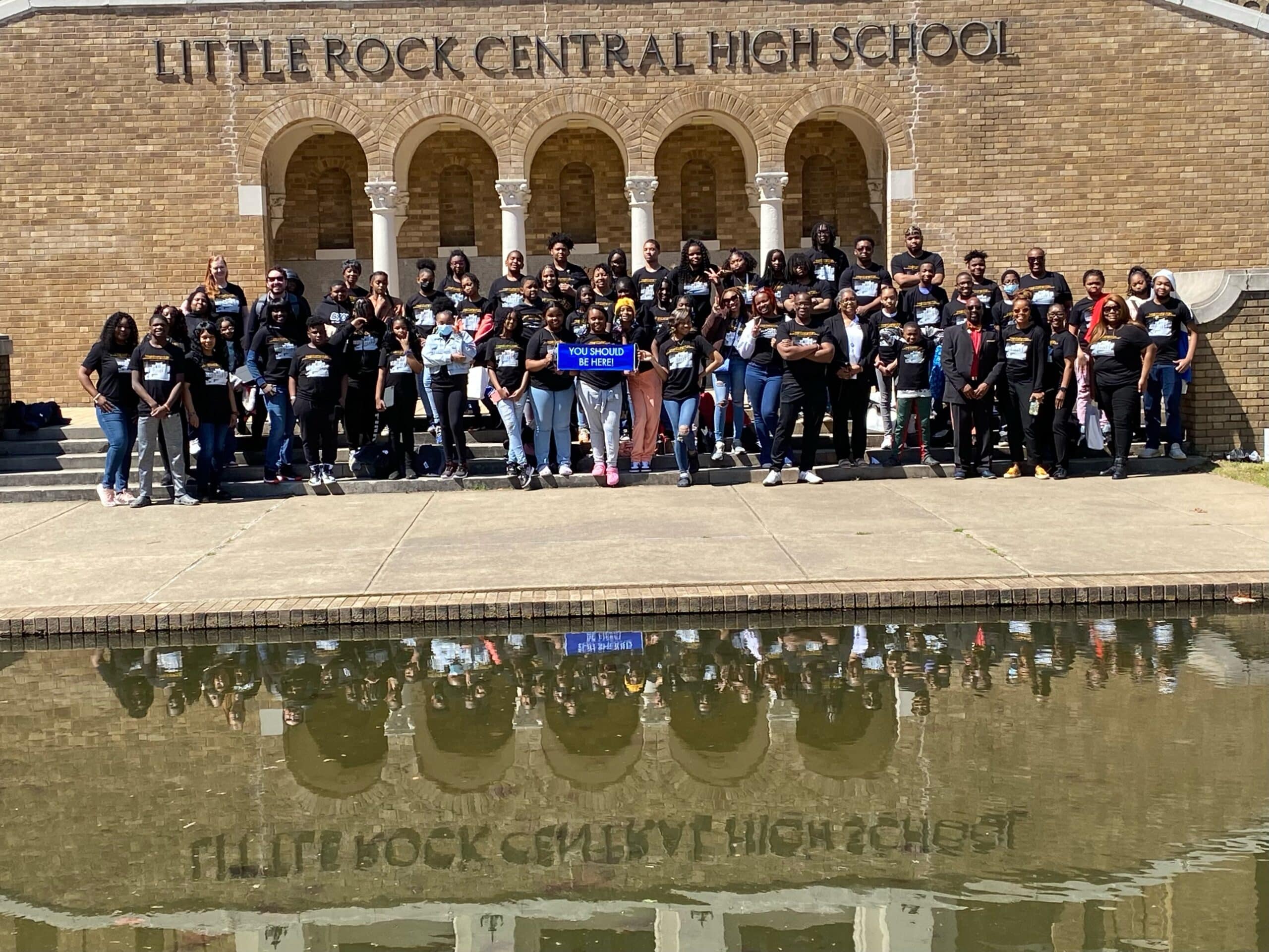 Students pose in front of Central High School in Little Rock, Arkansas